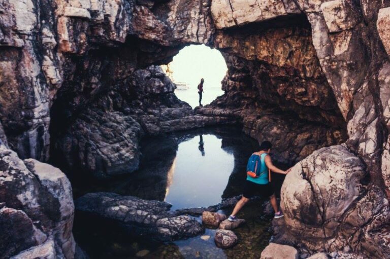Exploring rocky caves on Lokrum Island near Dubrovnik