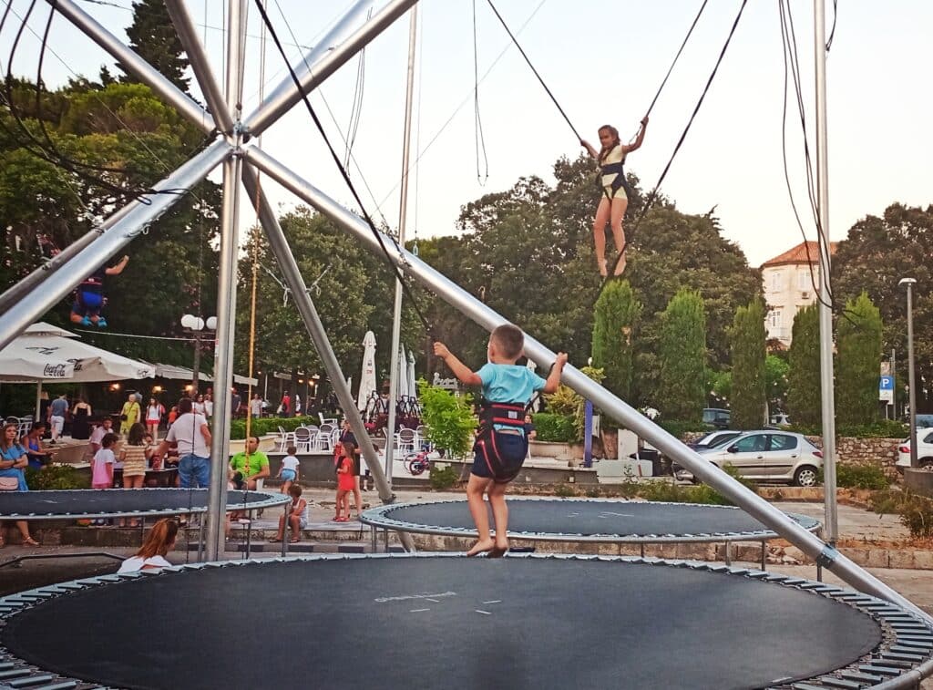 Jumping on a trampoline is a cool thing to do in Dubrovnik with kids