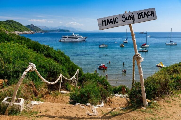 Šunj Beach on Lopud Island near Dubrovnik with boats and clear blue water