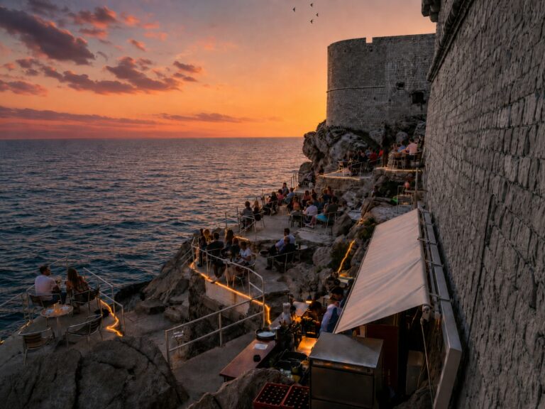 buza cliff bar on the rocks of city walls for sunset